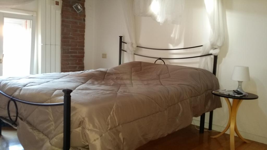 Mansarda Santa Margherita Apartman Bologna Szoba fotó